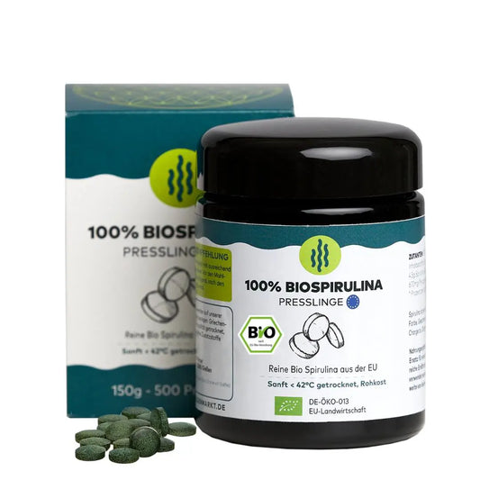 Spirulina pressling in ein 150g Violettglas, verpackt in ein Blister karton algenmarkt